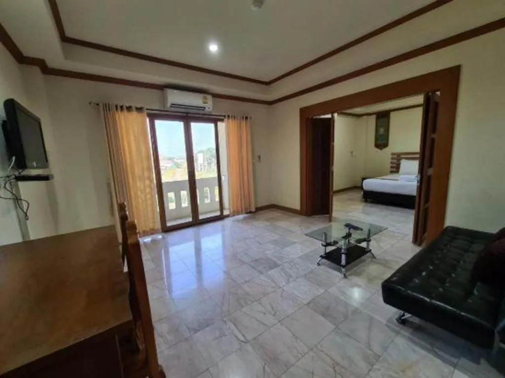 Bed in AmornSukhothai Hotel