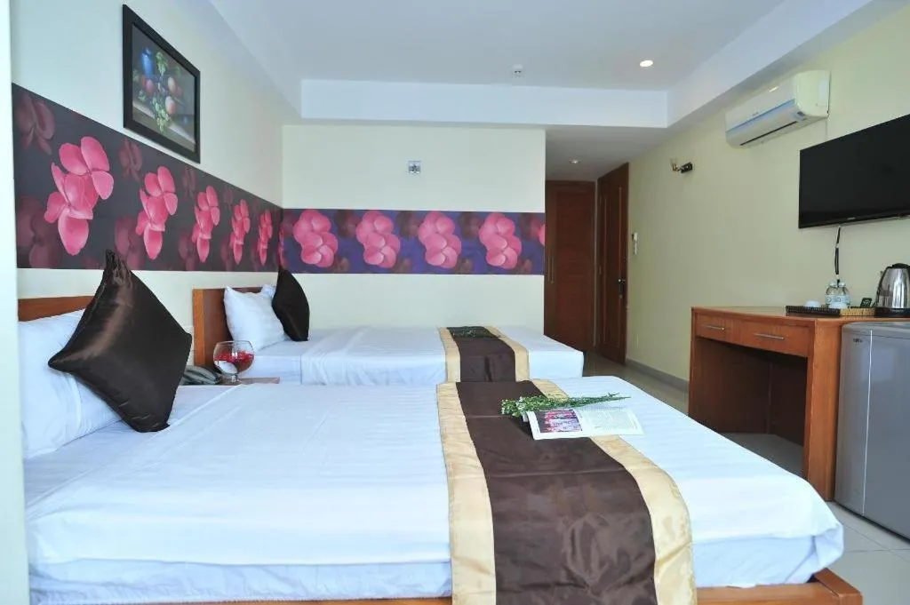Bed in AMITY HOTEL