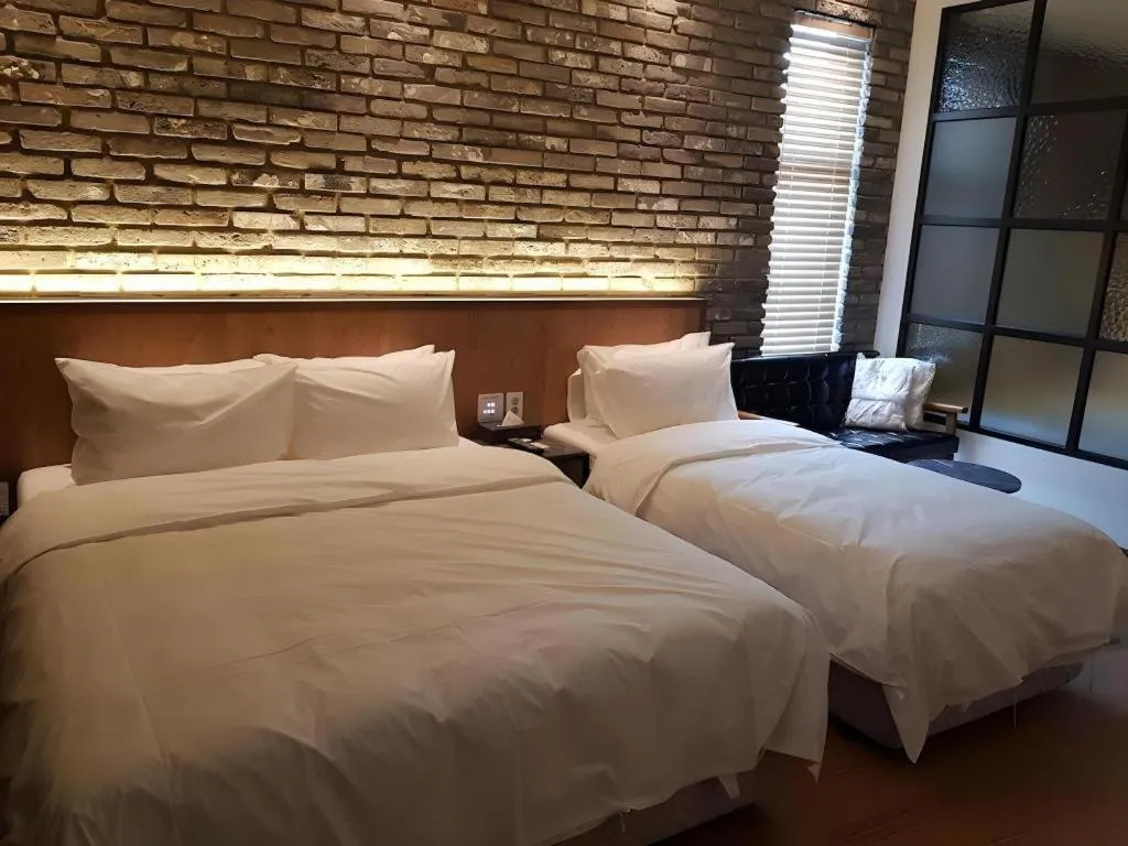 Bed in Hotel Morning Calm