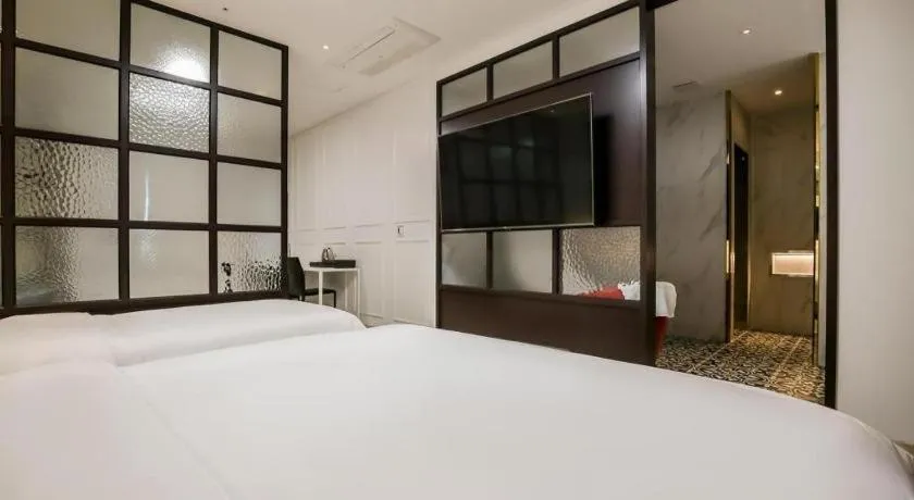 Bed in Hotel Morning Calm