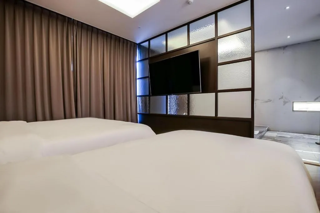 Bed in Hotel Morning Calm