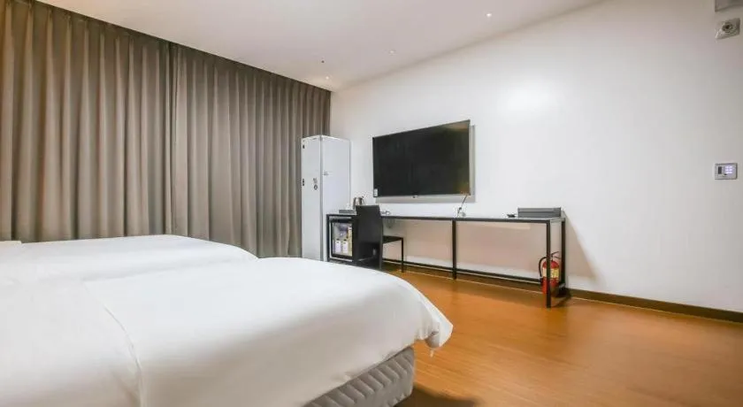 Bed in Hotel Morning Calm