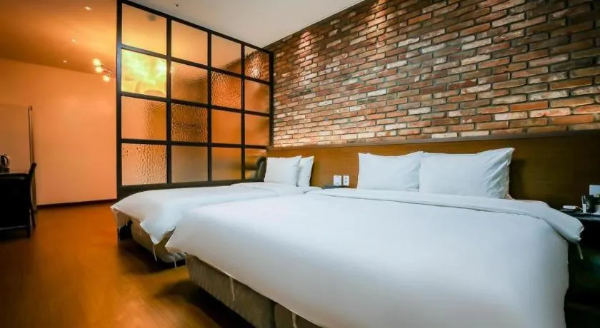 Bed in Hotel Morning Calm