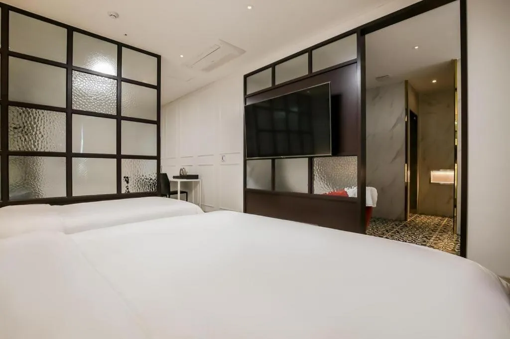 Bed in Hotel Morning Calm