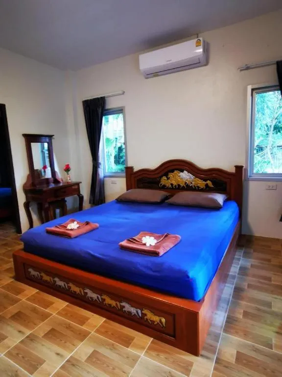 Bed in Sanook Sanang Resort
