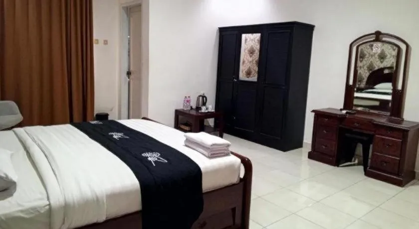 Bed in The Garden Hotel