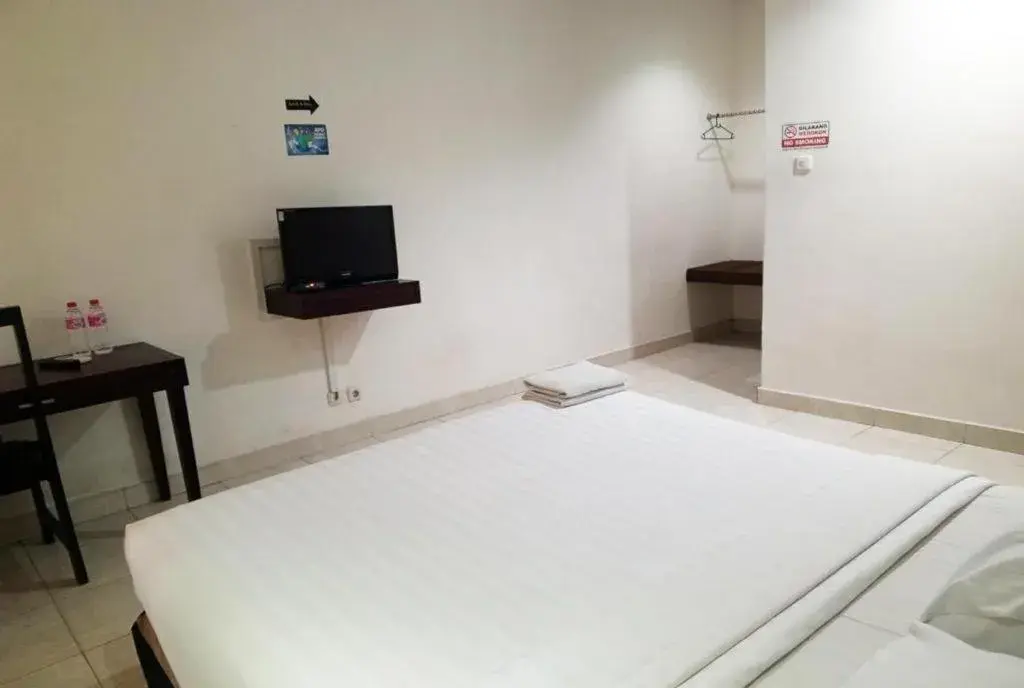 Bed in The Garden Hotel Bed in The Garden Hotel