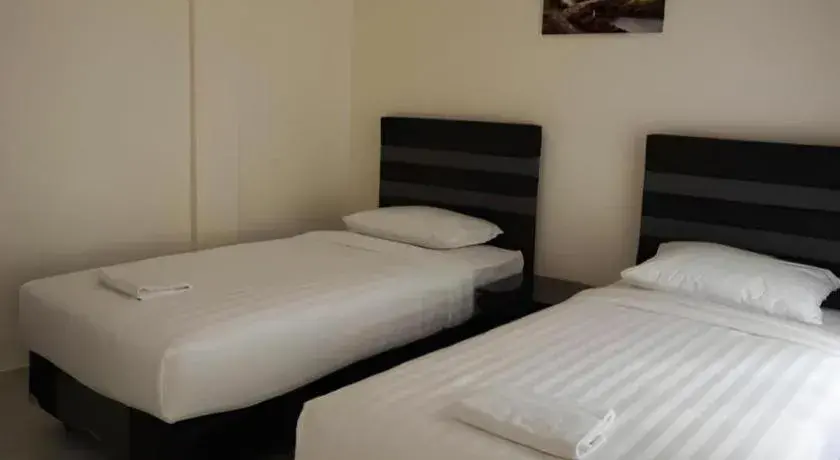 Bed in The Garden Hotel Bed in The Garden Hotel