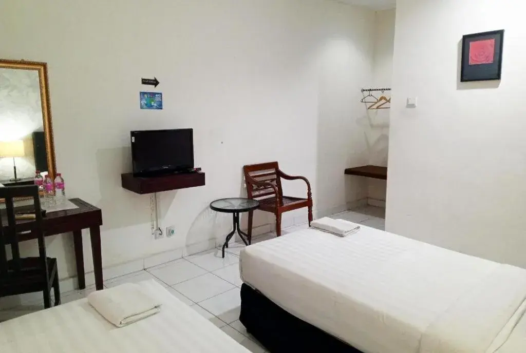 Bed in The Garden Hotel Bed in The Garden Hotel