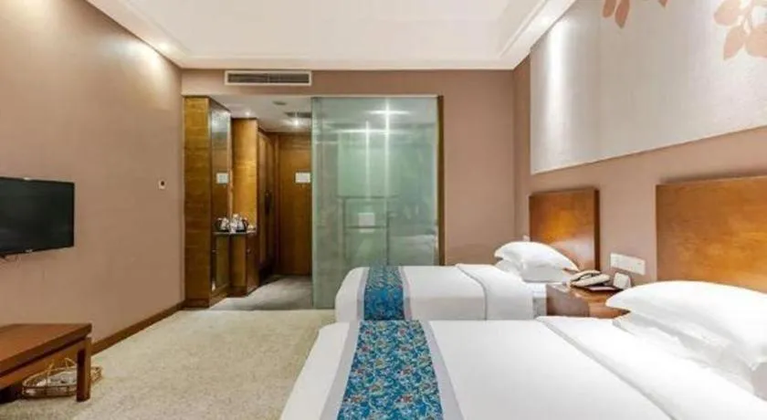 Bed in Wuxi Shanse Hotel