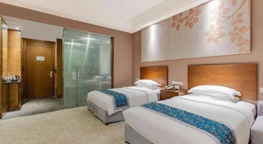 Bed in Wuxi Shanse Hotel