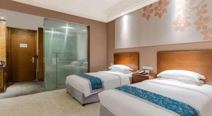 Bed in Wuxi Shanse Hotel