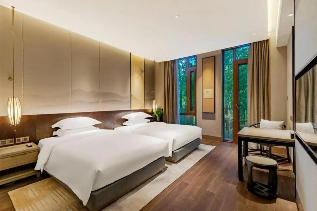 Bed in Wuxi Shanse Hotel
