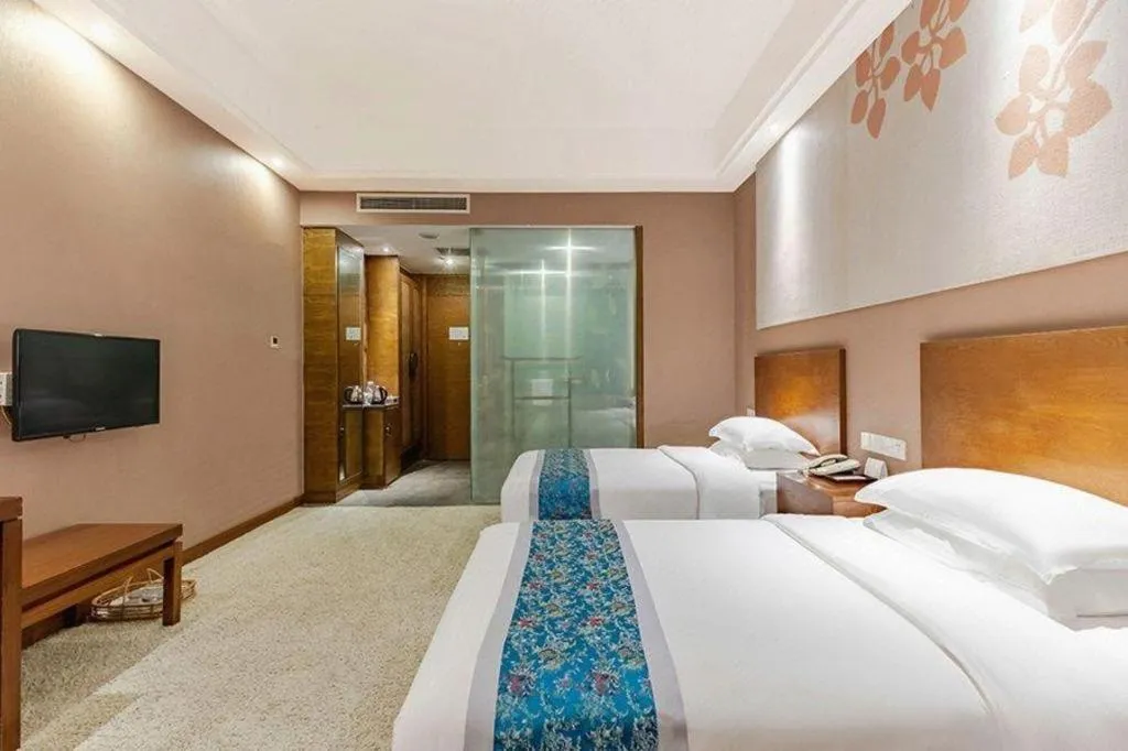 Bed in Wuxi Shanse Hotel