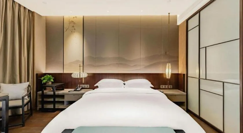 Bed in Wuxi Shanse Hotel
