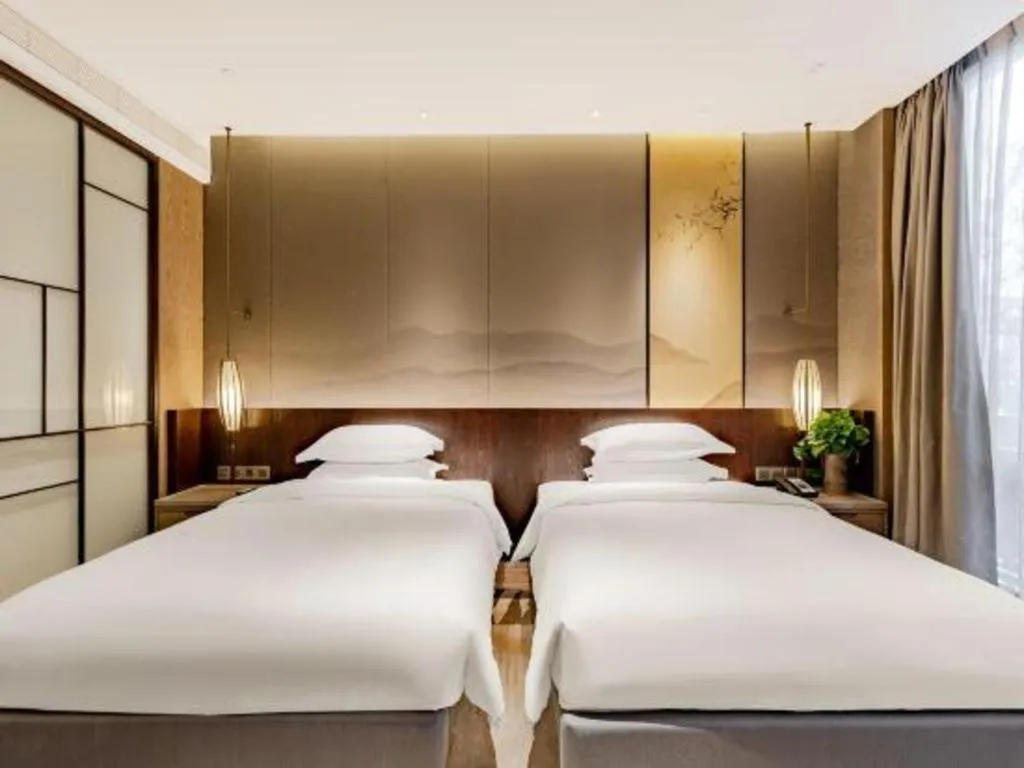Bed in Wuxi Shanse Hotel