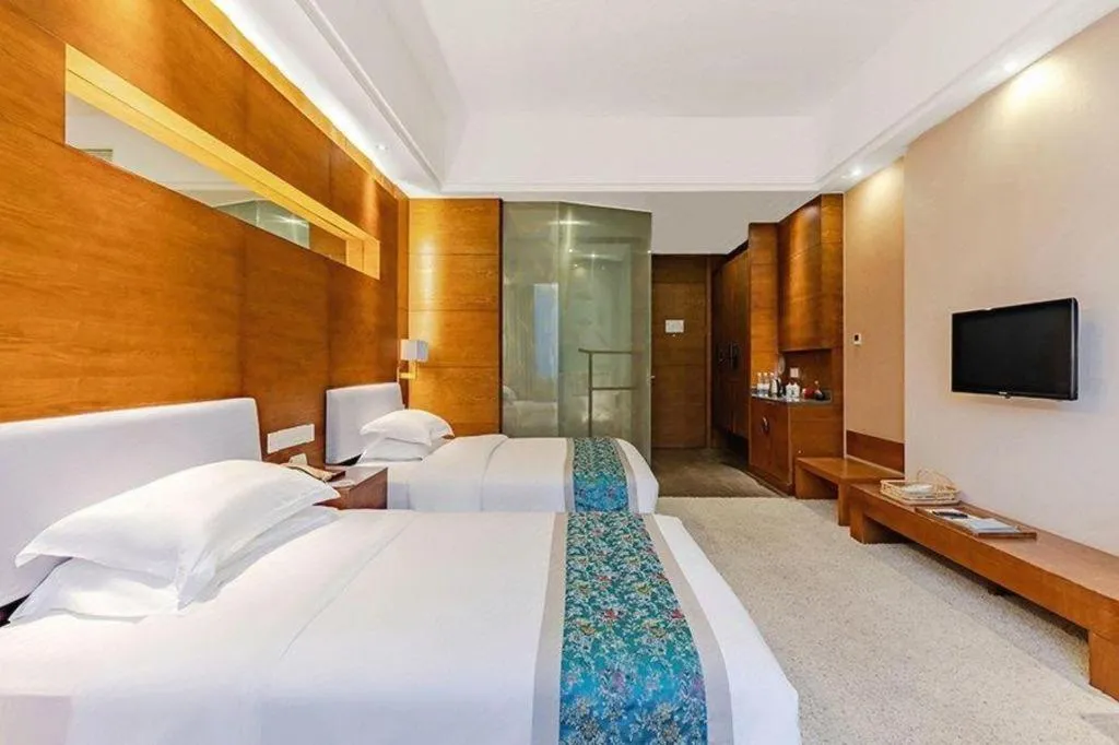 Bed in Wuxi Shanse Hotel