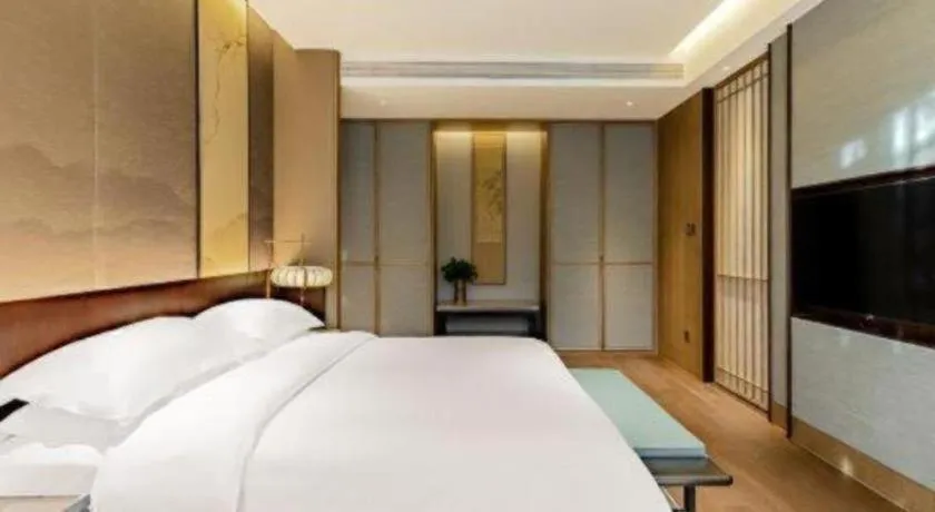 Bed in Wuxi Shanse Hotel