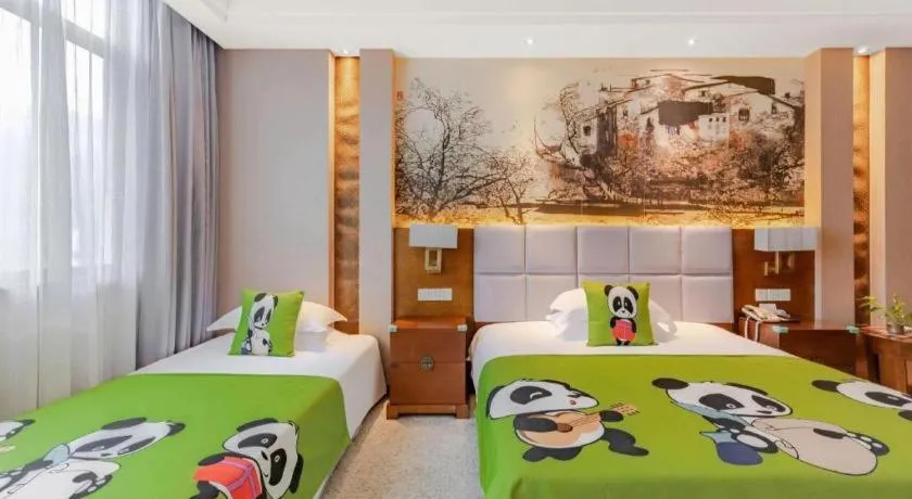 Bed in Wuxi Shanse Hotel