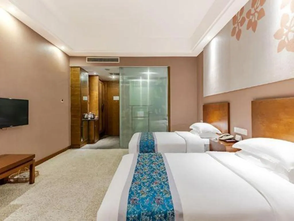 Bed in Wuxi Shanse Hotel
