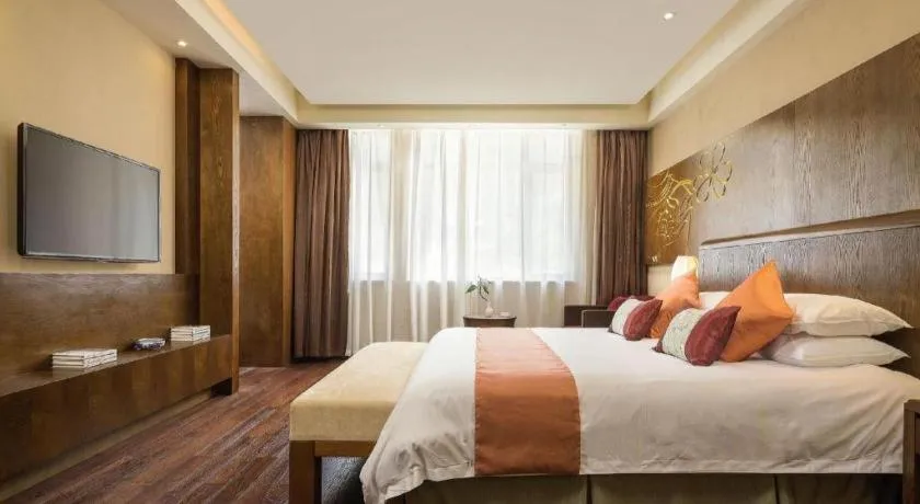 Bed in Wuxi Shanse Hotel