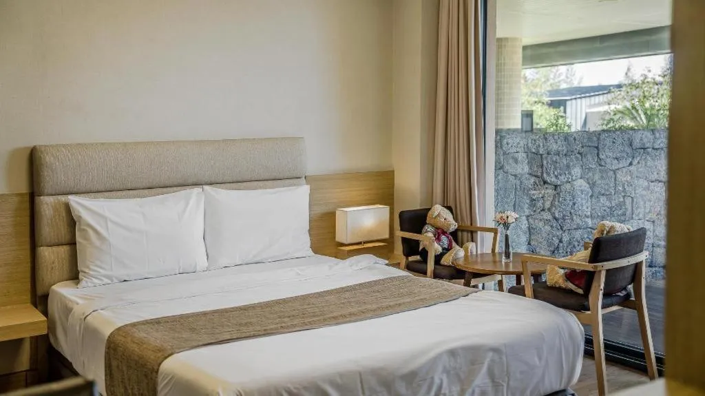 Bed in Dam and Roo Resort