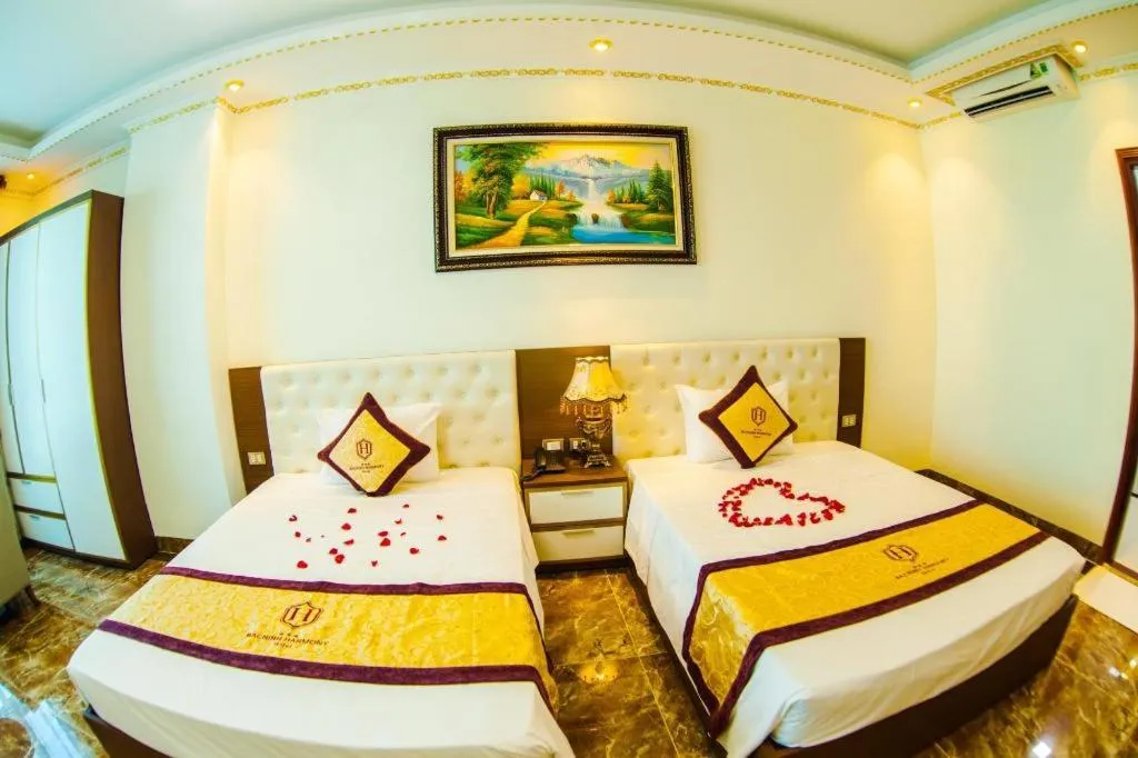 Bed in BACNINH HARMONY HOTEL