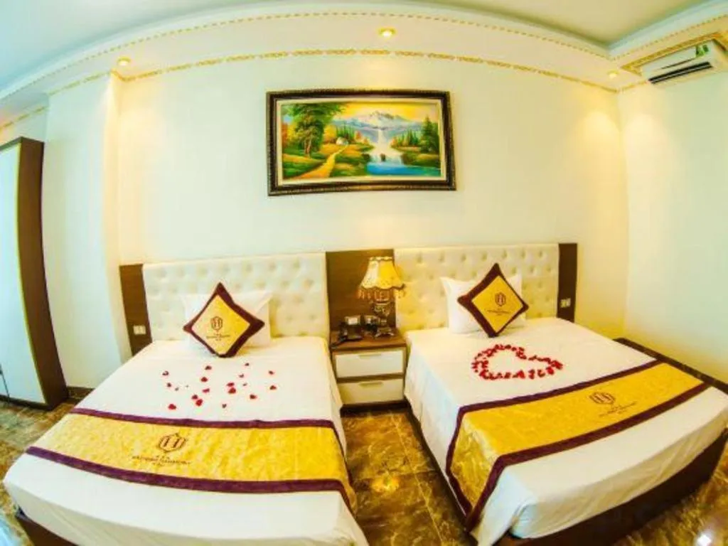 Bed in BACNINH HARMONY HOTEL