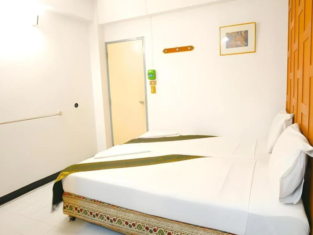 Bed in New Siam Guest House