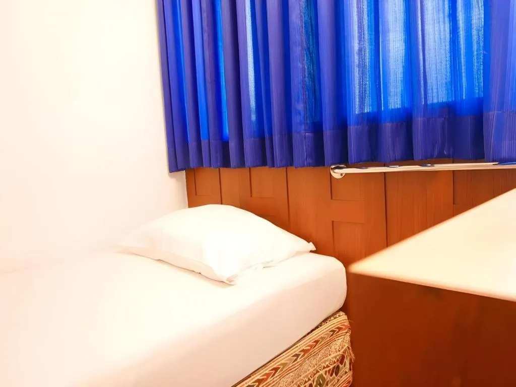 Bed in New Siam Guest House