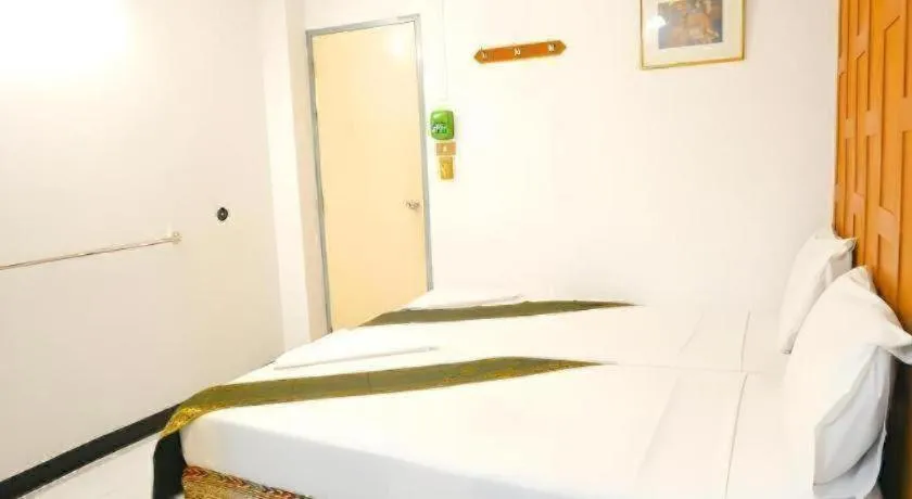 Bed in New Siam Guest House