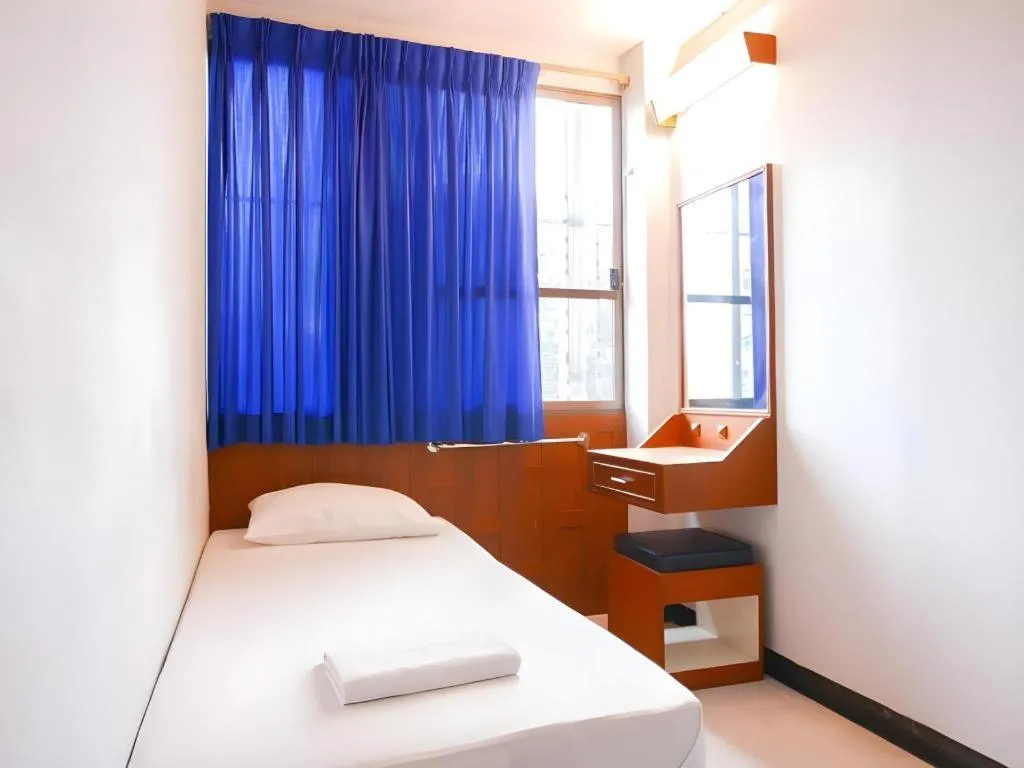 Bed in New Siam Guest House