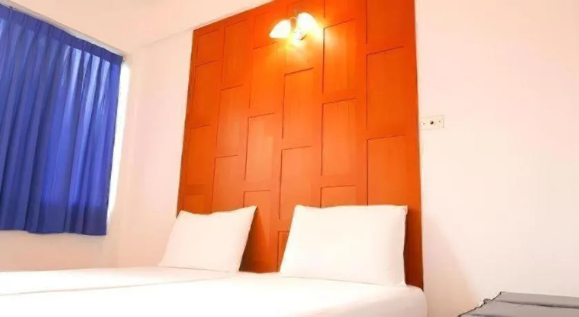 Bed in New Siam Guest House