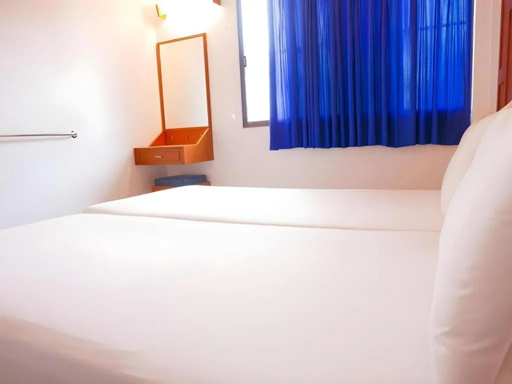 Bed in New Siam Guest House