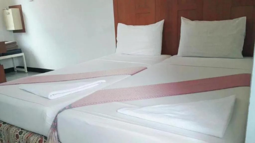 Bed in New Siam Guest House