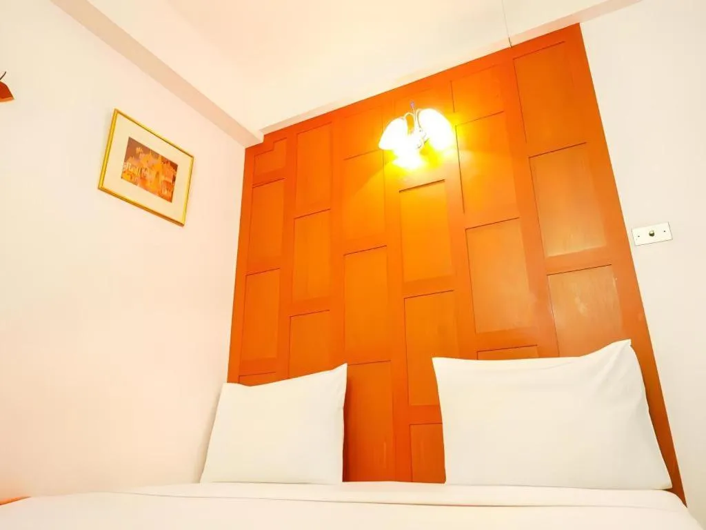 Bed in New Siam Guest House