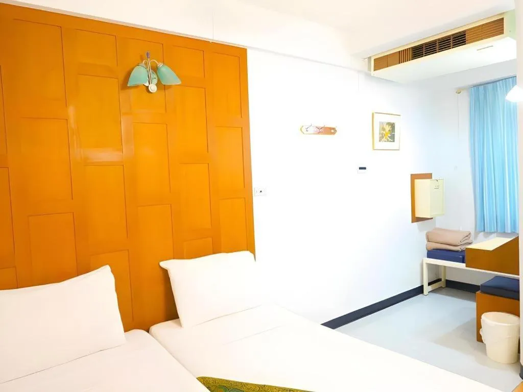 Bed in New Siam Guest House