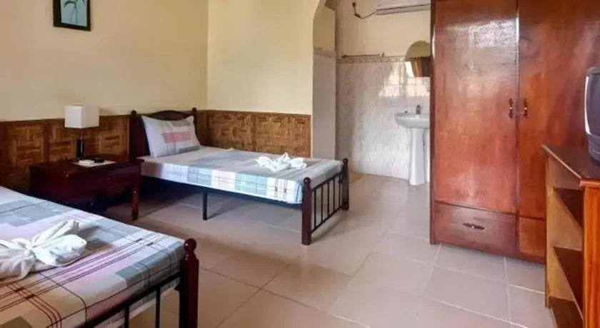 Bed in Coucou Bar Hotel and Restaurant Bed in Coucou Bar Hotel and Restaurant