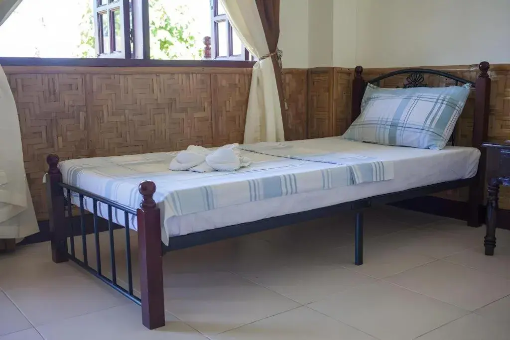 Bed in Coucou Bar Hotel and Restaurant Bed in Coucou Bar Hotel and Restaurant