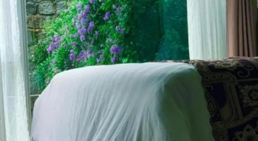 Bed in La Roza Dalat Boutique Hotel