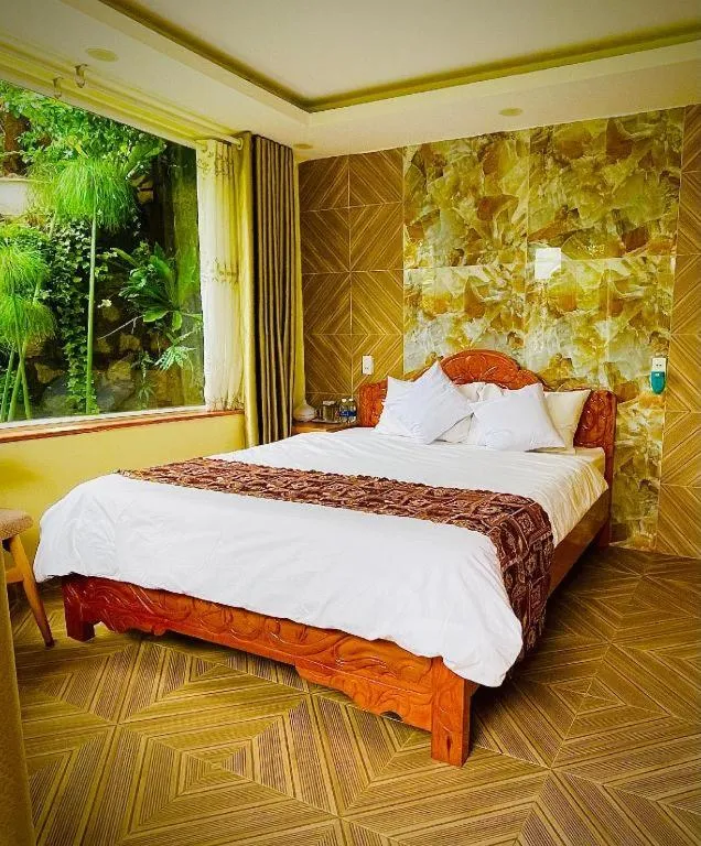Bed in La Roza Dalat Boutique Hotel