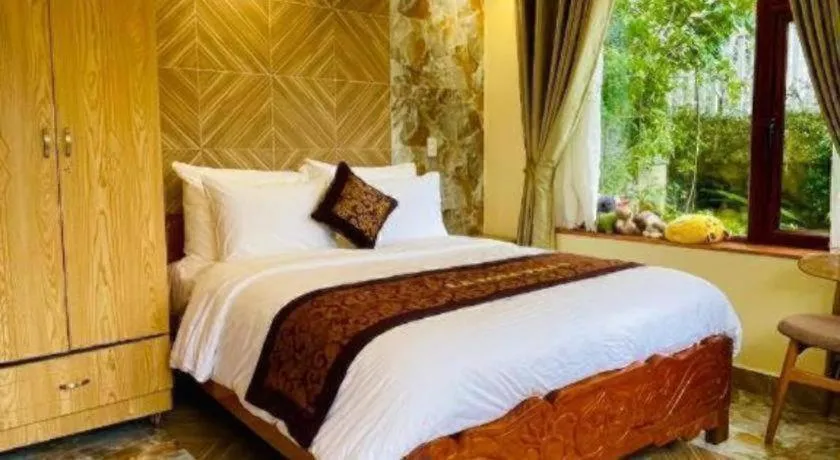 Bed in La Roza Dalat Boutique Hotel