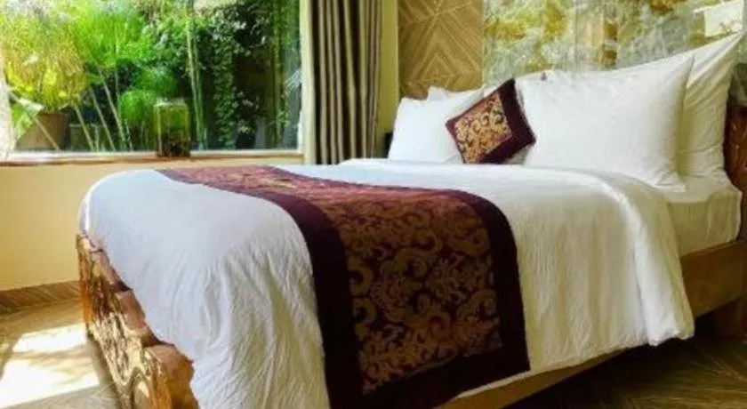 Bed in La Roza Dalat Boutique Hotel