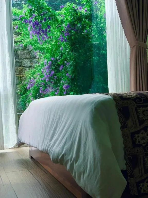 Bed in La Roza Dalat Boutique Hotel