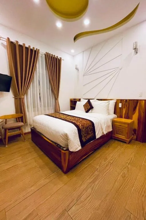 Bed in La Roza Dalat Boutique Hotel