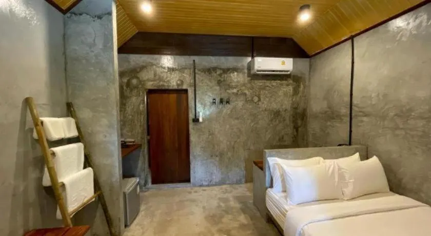 Bed in Koh Mook De Tara Beach Resort