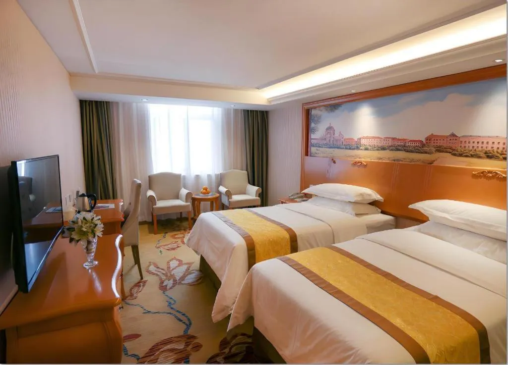 Bed in Vienna Hotel Xi'an Zhonglou