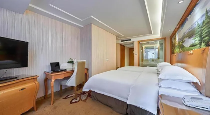 Bed in Vienna Hotel Xi'an Zhonglou