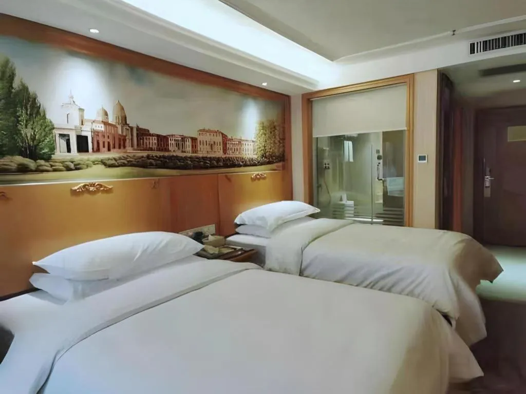 Bed in Vienna Hotel Xi'an Zhonglou