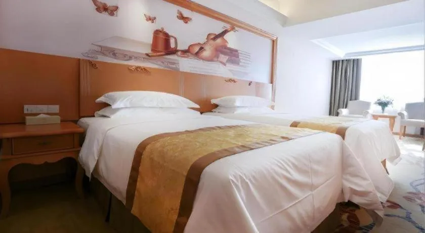 Bed in Vienna Hotel Xi'an Zhonglou